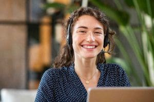 Customer service adviser wearing a telephone headset