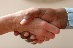 Two people shaking hands